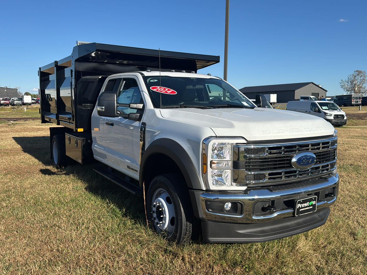 2024 Ford Super Duty F-550 DRW 12' RUGBY HEAVY DUTY STAKELESS LANDSCAPE BODY, 48" BARN DOORS, MANUAL TARP, 36' FULL CAB SHIELD, DROP DOWN COMBO HITCH 2 5/16"