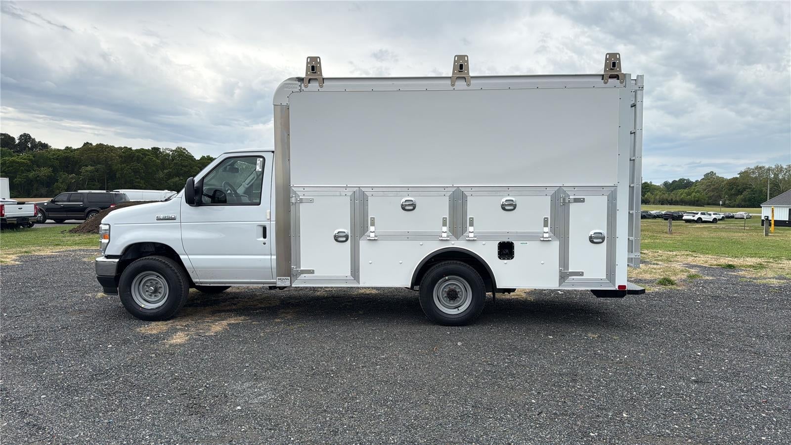 2027 Ford E-Series Cutaway 12' DURA-CUBE MAX FRP ENCLOSED SERVICE BODY, POWER LOCKS, 3 BOX LADDER RACK, BACK UP CAMERA