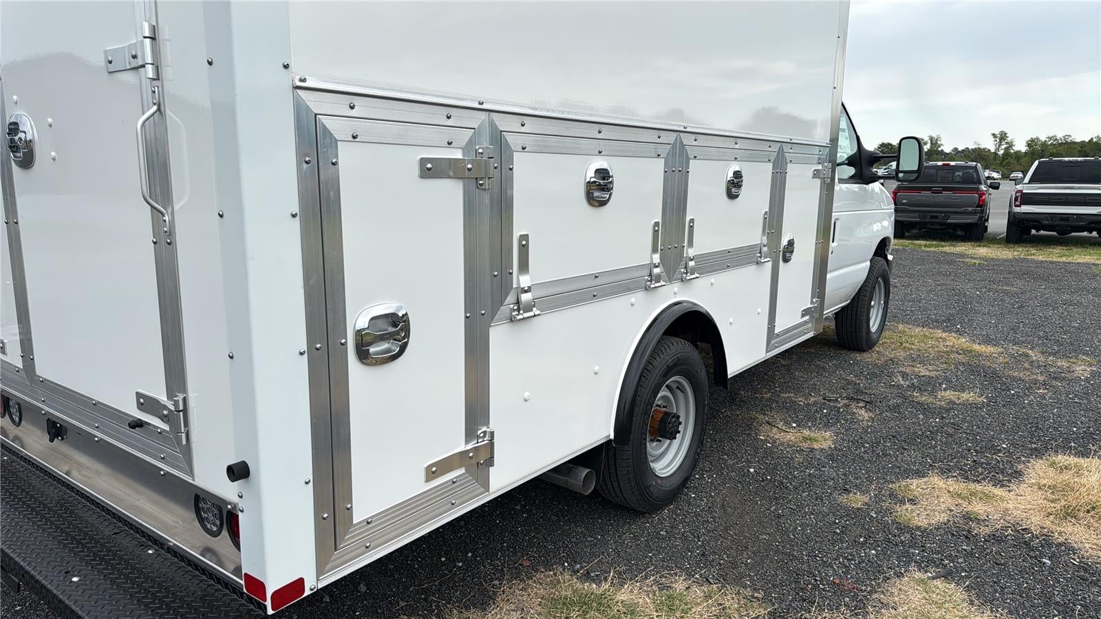 2027 Ford E-Series Cutaway 12' DURA-CUBE MAX FRP ENCLOSED SERVICE BODY, POWER LOCKS, 3 BOX LADDER RACK, BACK UP CAMERA